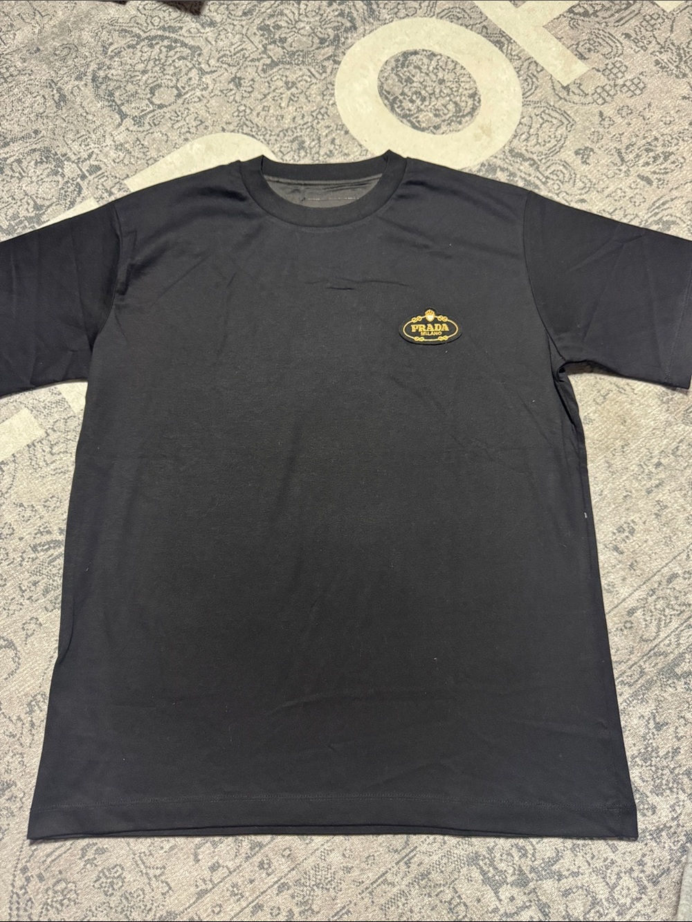 Prada Black Short Sleeve Tee with Gold Logo Patch